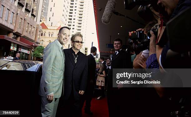 David Furnish and his partner Sir Elton John attends the Sydney premiere of "Billy Elliot The Musical" at the Capitol Theatre on December 13, 2007 in...
