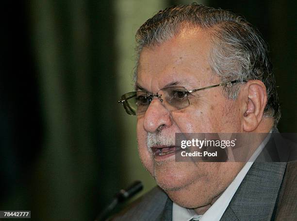 Iraq's President Jalal Talabani speaks during a meeting with tribal members of the awakening council, in Baghdad December 13, 2007. REUTERS/Mohammed...