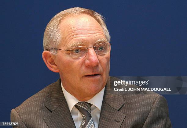 German Interior Minister Wolfgang Schaeuble speaks to AFP journalists during an exclusive interview at the agency's German headquarters in Berlin 12...