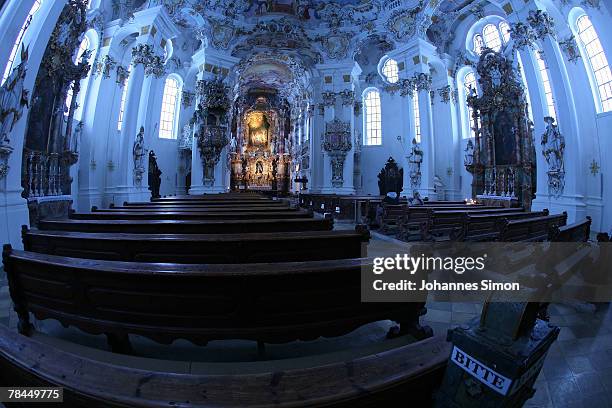 The illuminated altarpiece of the UNESCO world heritage site of the baroque Wieskirche Church is seen on December 13, 2007 in Wildsteig, Germany....