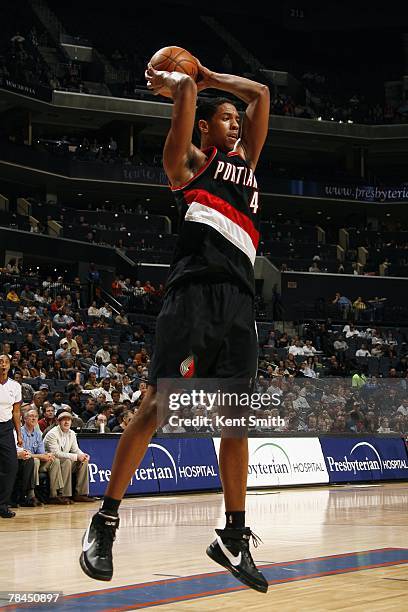 Channing Frye of the Portland Trail Blazers looks to pass during the game against the Charlotte Bobcats at the Charlotte Bobcats Arena on November...