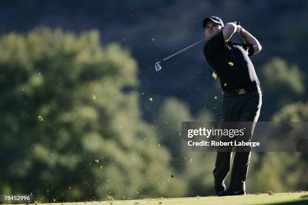 Rory Sabbatini of South Africa makes an approach shot on the 18th hole during round one of the Target World Challenge at the Sherwood Country Club...