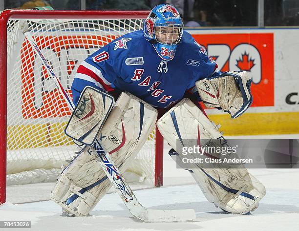 Josh Unice of the Kitchener Rangers gets set to make a save in a game against the London Knights on December 9, 2007 at the John Labatt Centre in...