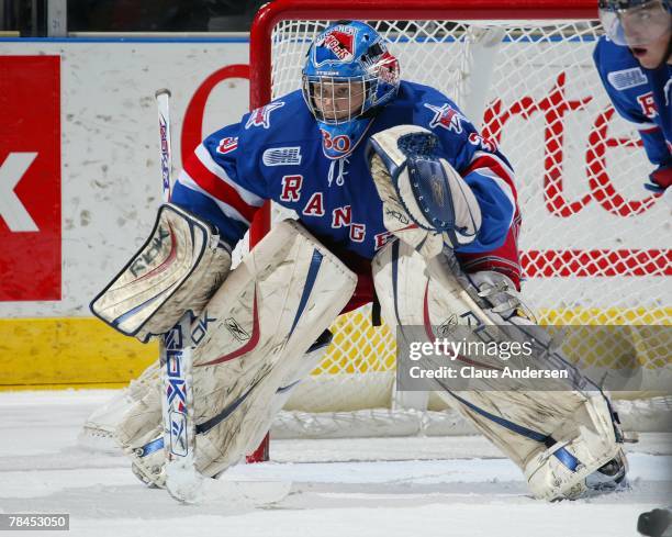 Josh Unice of the Kitchener Rangers gets set to make a save in a game against the London Knights on December 9, 2007 at the John Labatt Centre in...