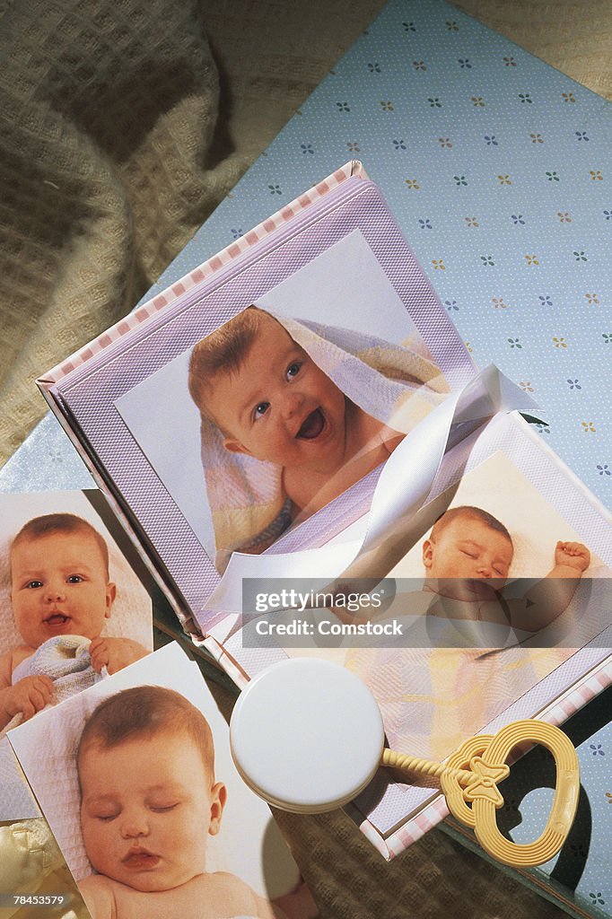 Baby pictures with rattle and blanket