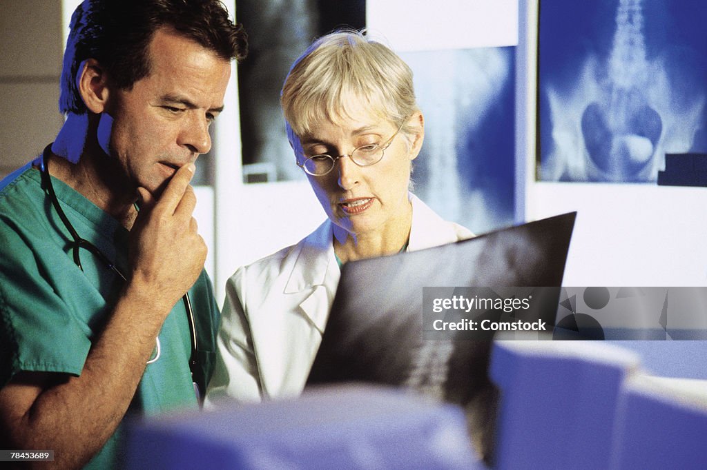 Doctors consulting about x-ray