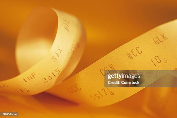 studio shot of tickertape - ticker tape stock pictures, royalty-free photos & images