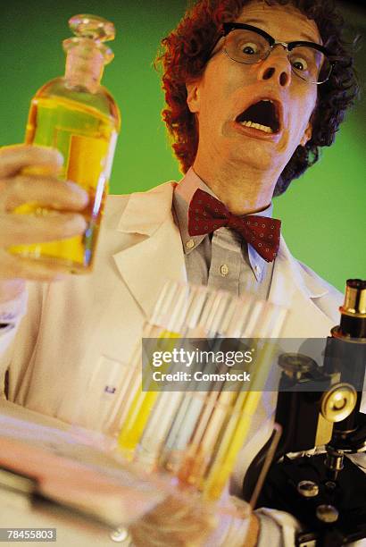 lab technician , mad scientist - inventor of microscope stock pictures, royalty-free photos & images