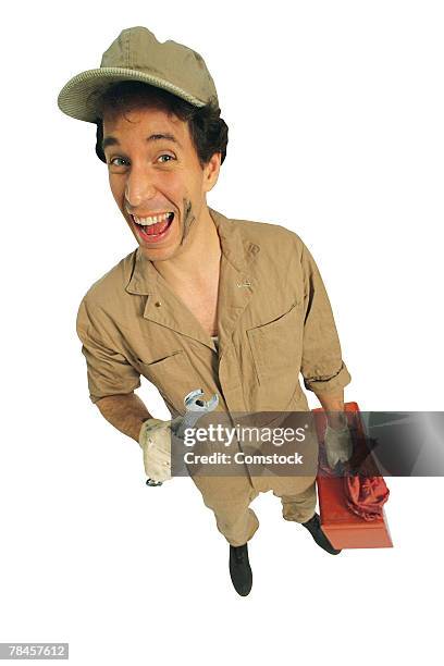 smiling handyman - handyman smiling imagens e fotografias de stock