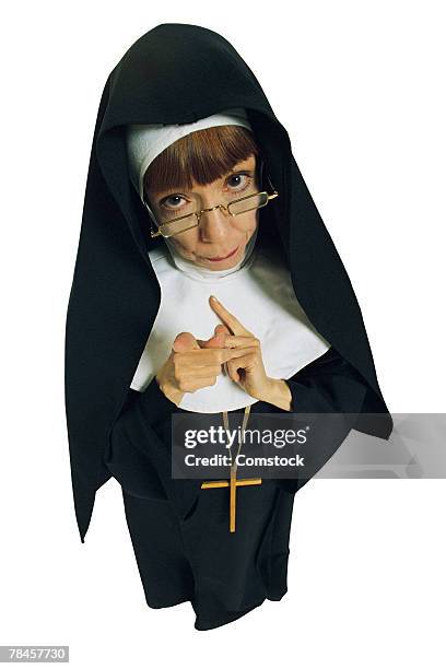 nun gesturing disapproval - nun isolated stock pictures, royalty-free photos & images