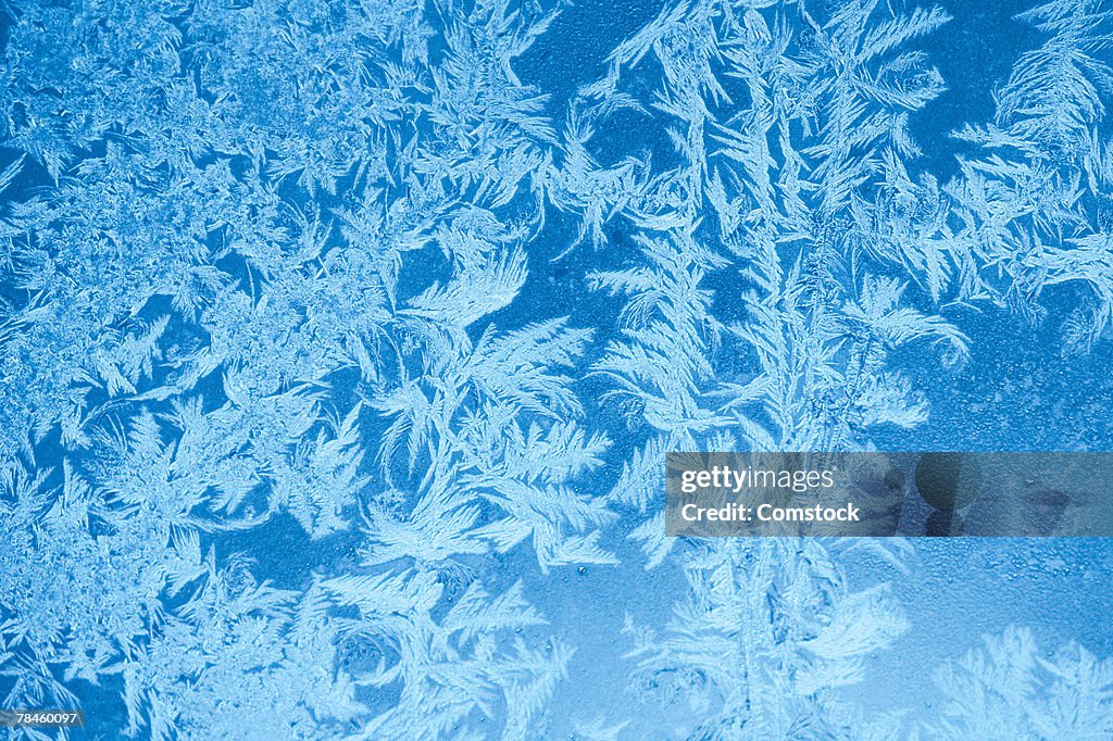 Elegant pattern of frost on window