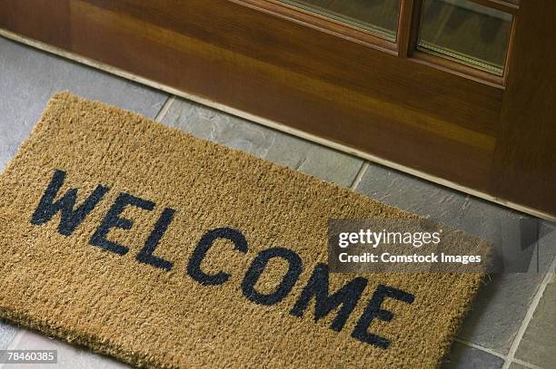 welcome mat - zerbino foto e immagini stock