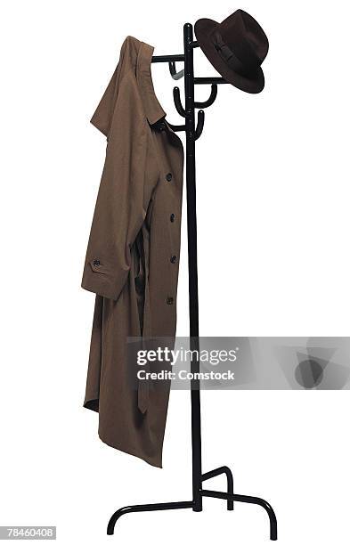 coat rack with coat and hat - coat rack stock pictures, royalty-free photos & images