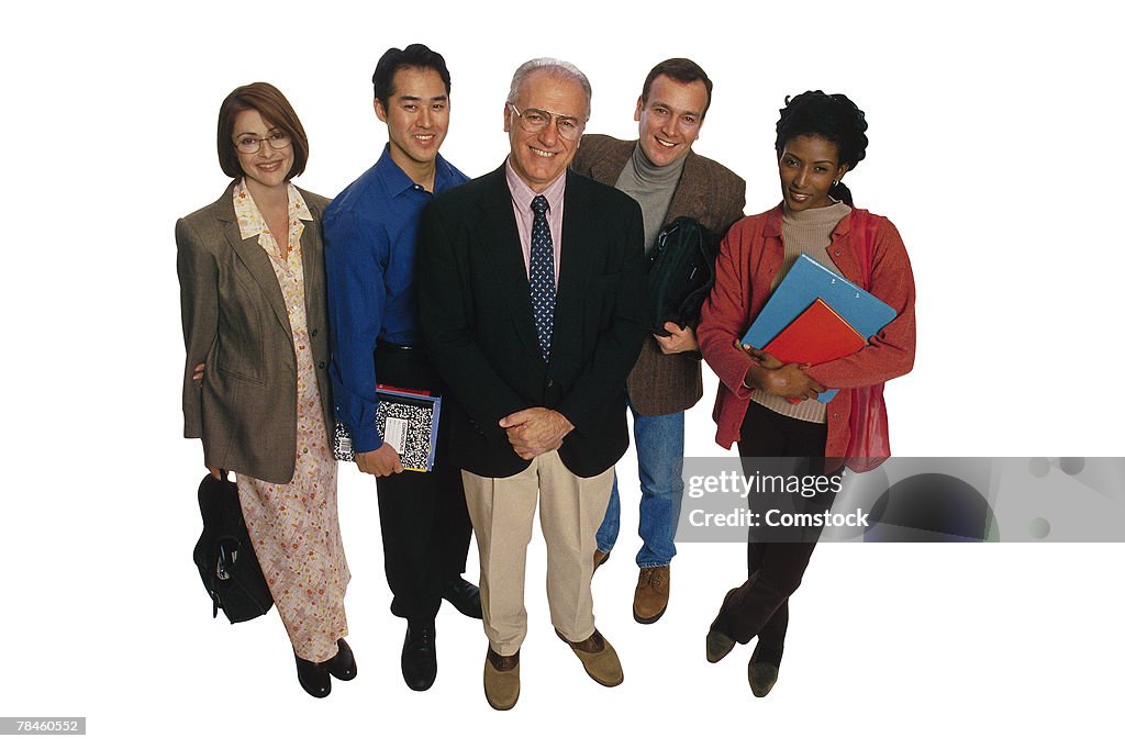 Principal and teachers posing for portrait