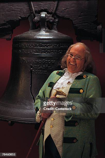 man portraying benjamin franklin with liberty bell - period costume stock pictures, royalty-free photos & images
