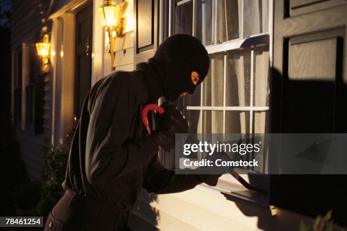 Pry Example Burglar Trying To Pry Open Window On House High-Res Stock Photo - Getty ...