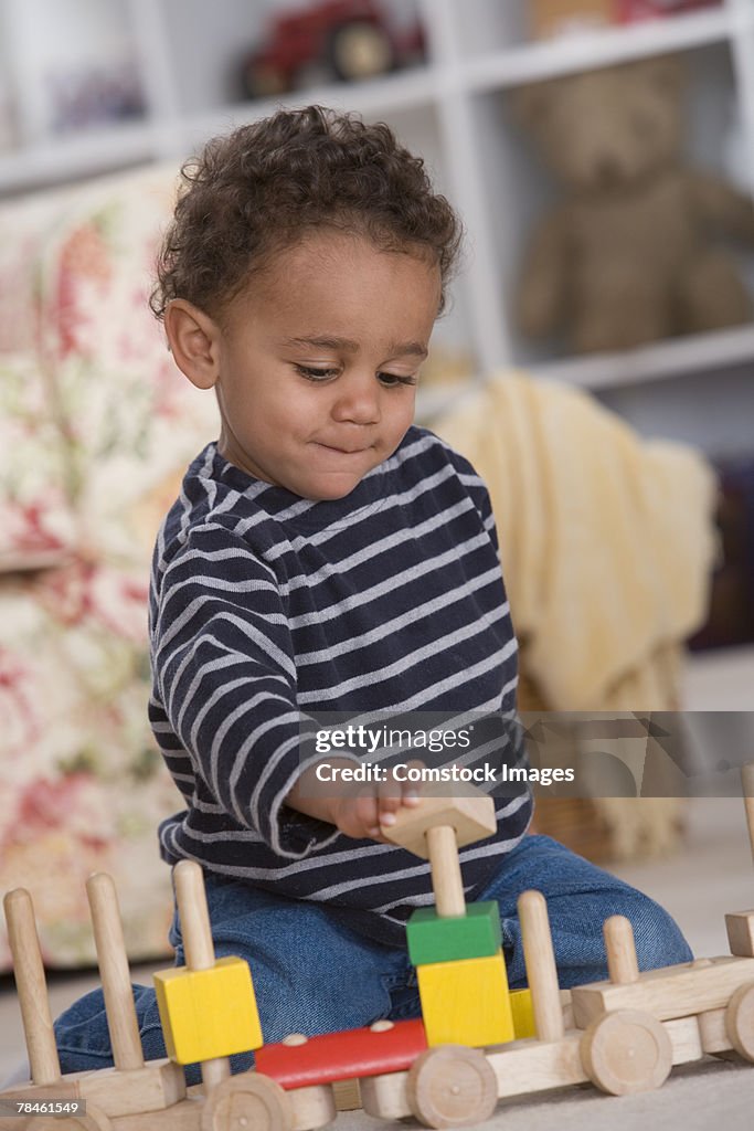 Boy playing with toys