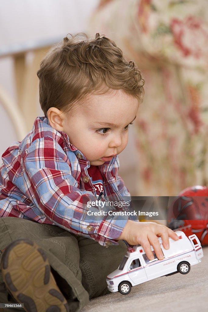 Boy playing with toys