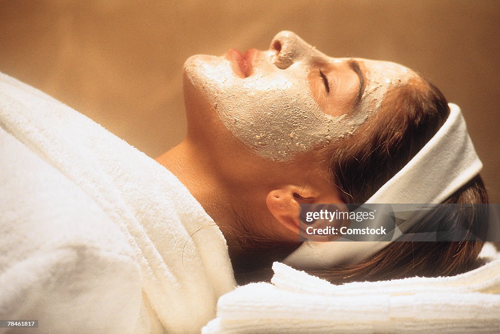 Profile of woman receiving facial treatment