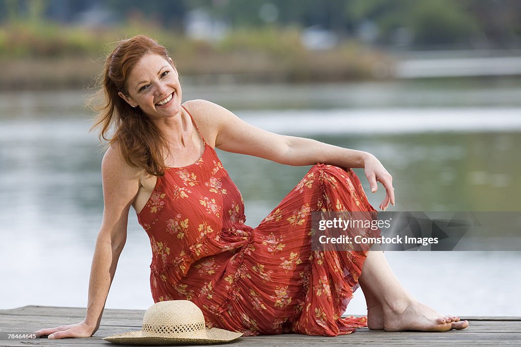 Woman relaxing by water