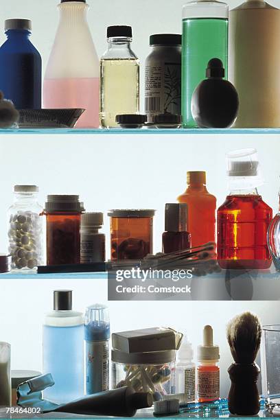 medicine bottles on shelves in vanity - bathroom cabinet stock pictures, royalty-free photos & images