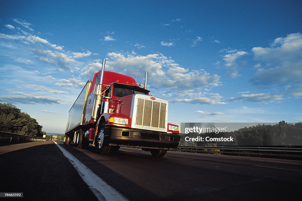 Semi truck barreling down highway