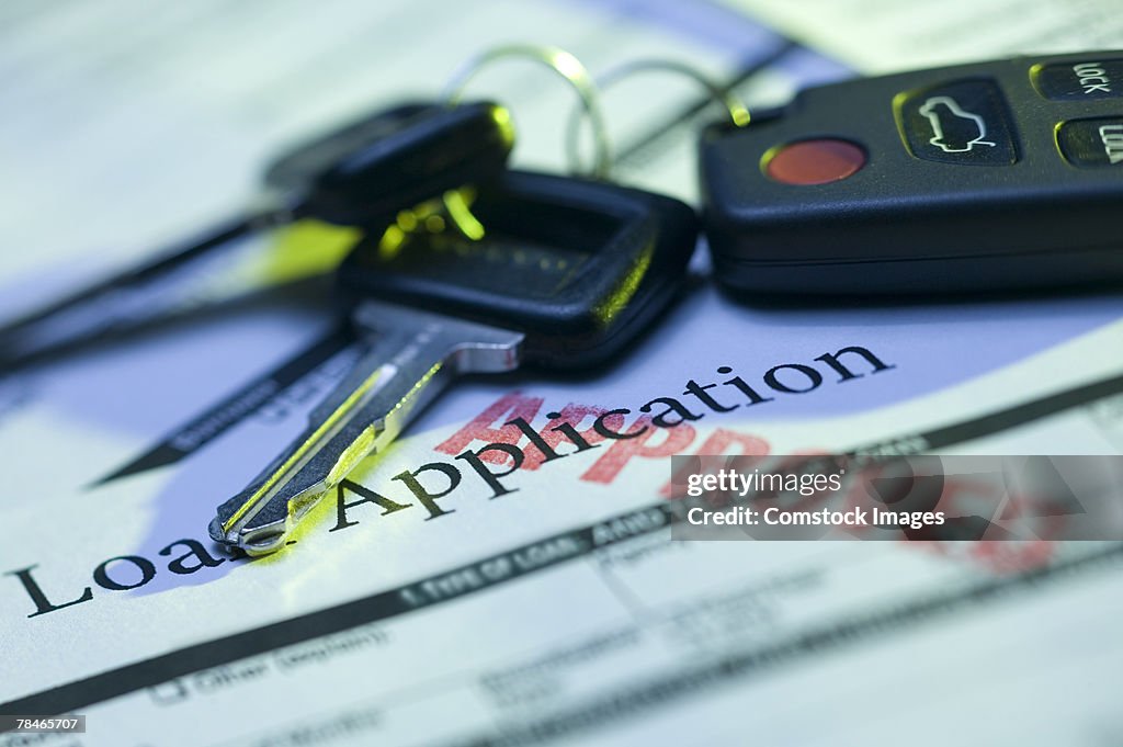 Car keys and approved loan application