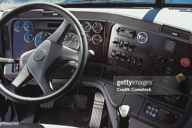 interior view of dashboard of semi truck - steering wheel foto e immagini stock