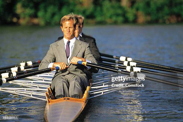 businessmen sculling - single scull stockfoto's en -beelden