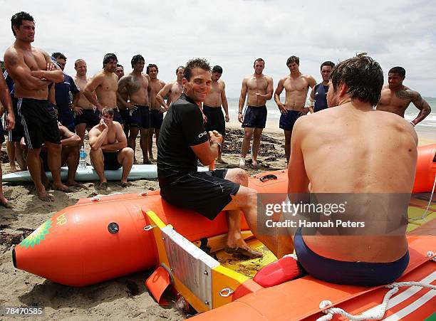 The Blues listen to instructions about the IRB from multiple World Ironman champion Cory Hutchings during a Blues training session at Mairangi Bay on...