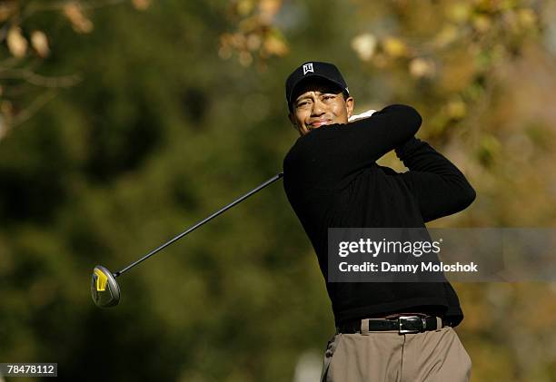 Tiger Woods makes a tee shot on the fifth hole during the second round of the Target World Challenge at the Sherwood Country Club on December 14,...