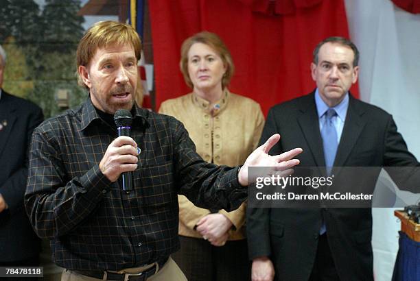 Actor Chuck Norris speaks to senior citizens while presidential hopeful Mike Huckabee and his wife Janet look on December 14, 2007 at a campaign...