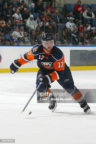 November 28: Shawn Bates of the New York Islanders skates during the NHL game against the Ottawa Senators at the Nassau Coliseum on November 28, 2007...