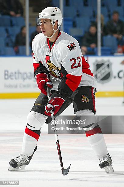 November 28: Chris Kelly of the Ottawa Senators butterflies the ice during the NHL game against the New York Islanders at the Nassau Coliseum on...