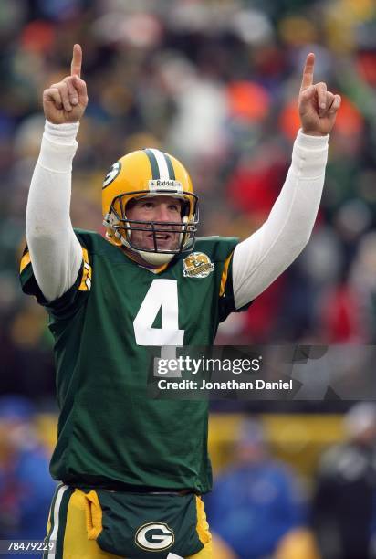 Brett Favre of the Green Bay Packers reacts to the touchdown against the Oakland Raiders on December 9, 2007 at Lambeau Field in Green Bay,...