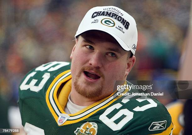 Scott Wells of the Green Bay Packers celebrates against the Oakland Raiders on December 9, 2007 at Lambeau Field in Green Bay, Wisconsin. The Packers...