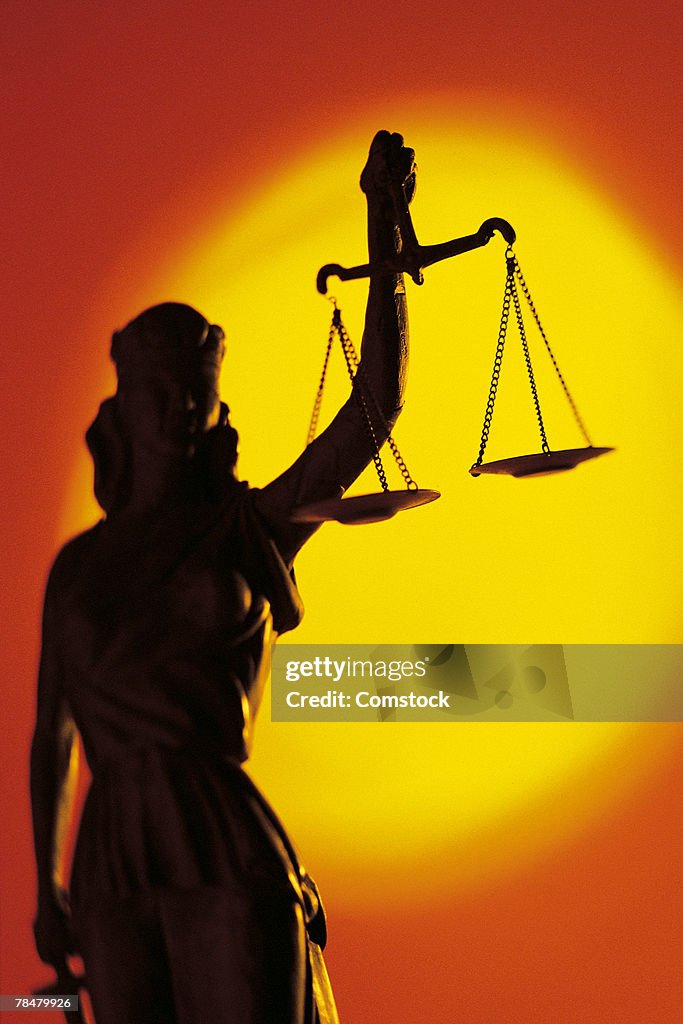 Silhouette of scales of justice