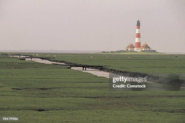 lighthouse - faro di westerhever foto e immagini stock