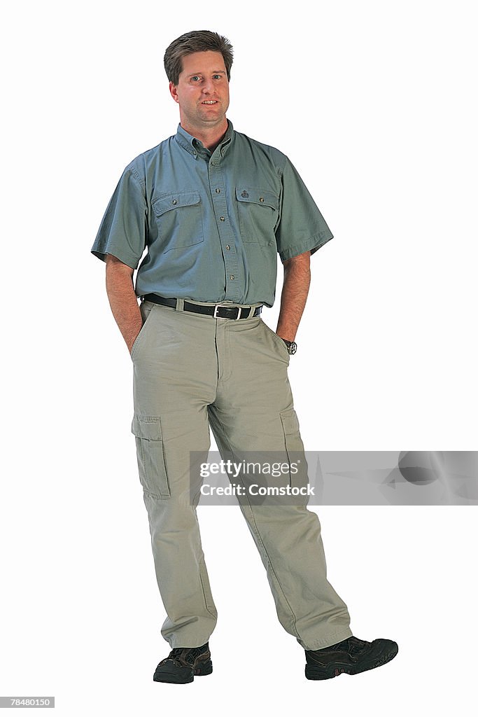 Man with hands in pockets