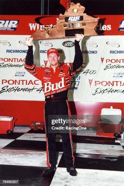 Dale Earnhardt, Jr. Shows off the winner's trophy after winning the 2000 Pontiac Excitement 400 at Richmond International Raceway.