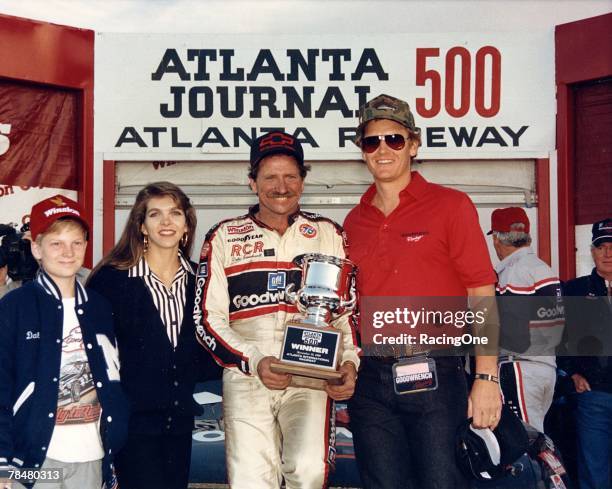 Dale Earnhardt, Jr., came to major league NASCAR racing early. Here pre-teen Junior and stepmom Teresa enjoy Dale, Sr.'s, win in the 1986 Atlanta...