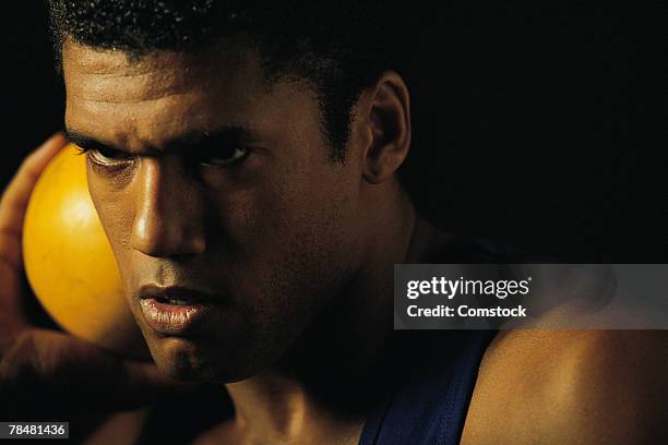 young man throwing shot put - shot put stock pictures, royalty-free photos & images