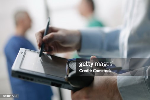 Doctor Using Electronic Notepad High-Res Stock Photo - Getty Images