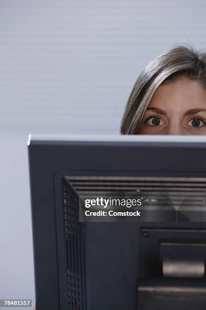 Woman Head Over Computer Screen 47 Peaking Over Computer Stock Photos, High-Res Pictures, and Images ...