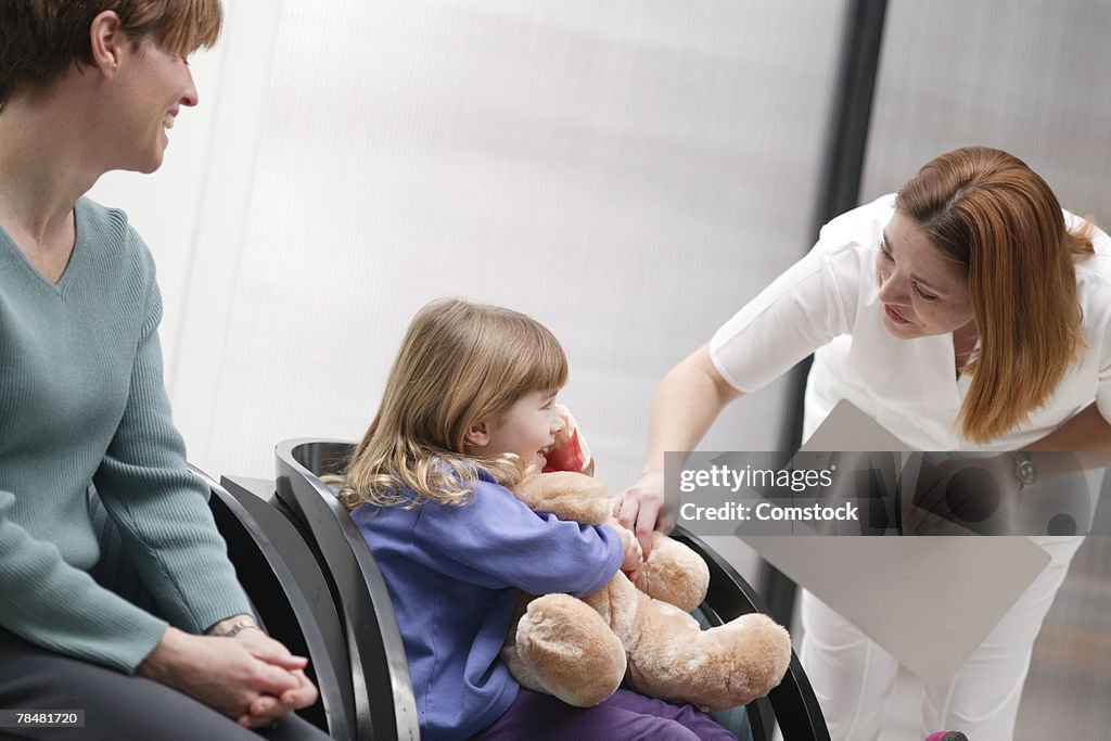 Nurse talking to girl