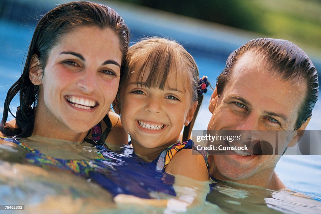 Family in pool