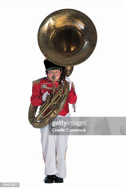 child in marching band uniform with sousaphone - tube foto e immagini stock