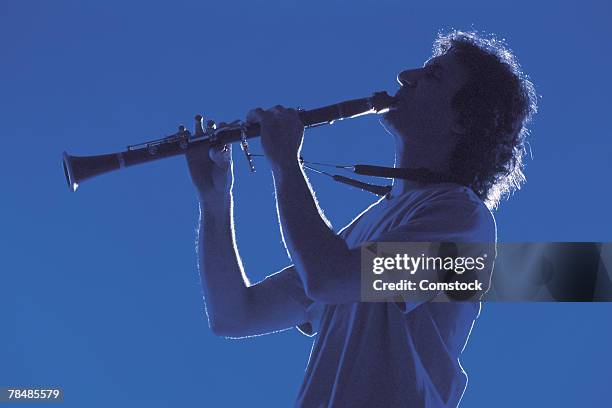man with clarinet - クラリネット ストックフォトと画像