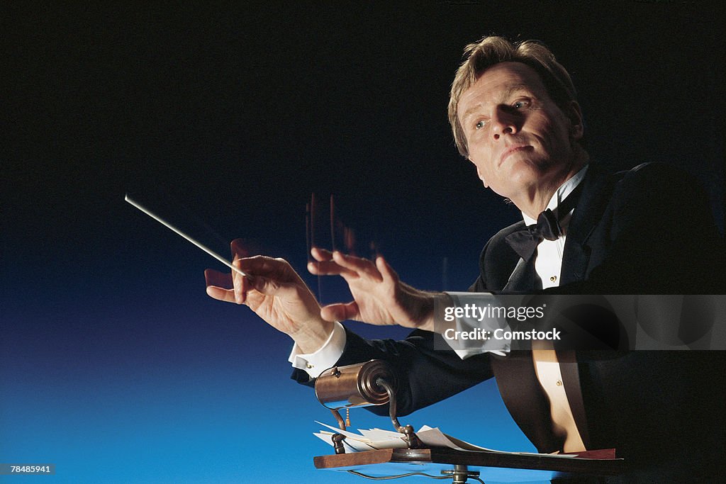 Man conducting symphony