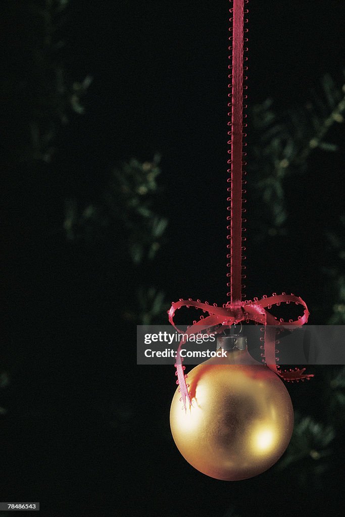 Christmas ornament hanging from ribbon